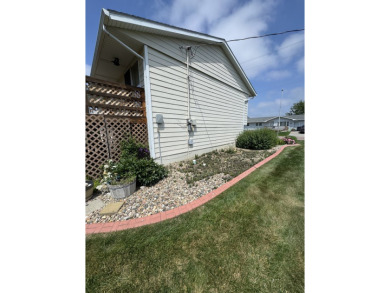 This well-kept split-level home in Winner, SD offers 1,044 sq ft on Winner Country Club in South Dakota - for sale on GolfHomes.com, golf home, golf lot