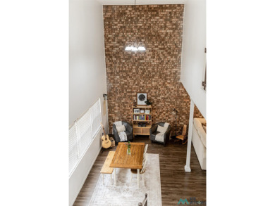 VINTAGE charm meets URBAN flair in this stylish townhome tucked on Chaparral Country Club in New Mexico - for sale on GolfHomes.com, golf home, golf lot