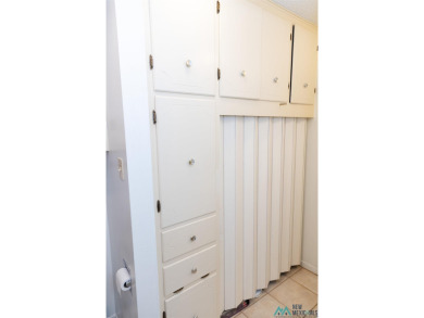 VINTAGE charm meets URBAN flair in this stylish townhome tucked on Chaparral Country Club in New Mexico - for sale on GolfHomes.com, golf home, golf lot