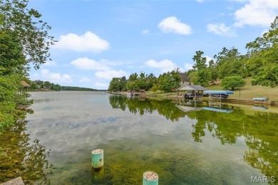 Lakefront living in Terre Du Lac! This brick and stone accented on Terre Du Lac Golf and Country Club in Missouri - for sale on GolfHomes.com, golf home, golf lot