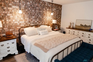 VINTAGE charm meets URBAN flair in this stylish townhome tucked on Chaparral Country Club in New Mexico - for sale on GolfHomes.com, golf home, golf lot