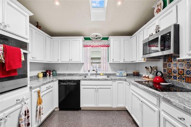 Escape the cold and embrace effortless Florida living in this on Betmar Acres Golf Club in Florida - for sale on GolfHomes.com, golf home, golf lot