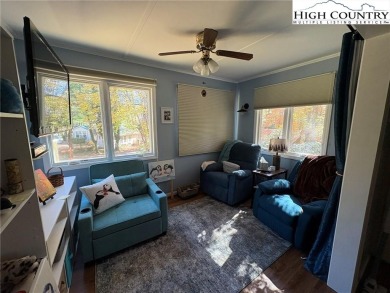 Fabulously located home in the resort community of Linville Land on Land Harbor Golf Course in North Carolina - for sale on GolfHomes.com, golf home, golf lot