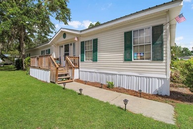 HOME, BOAT , GOLF CART AND MULTIPLE STORAGE BUILDINGS CAN BE ALL on Sapelo Hammock Golf Club in Georgia - for sale on GolfHomes.com, golf home, golf lot