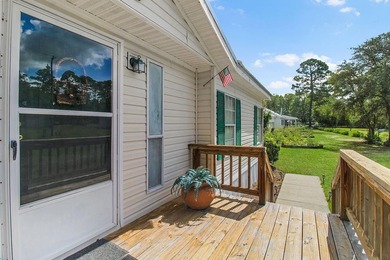 HOME, BOAT , GOLF CART AND MULTIPLE STORAGE BUILDINGS CAN BE ALL on Sapelo Hammock Golf Club in Georgia - for sale on GolfHomes.com, golf home, golf lot