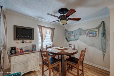 Downtown Calabash! This first-floor furnished condo has been on Carolina Shores Golf Course in North Carolina - for sale on GolfHomes.com, golf home, golf lot