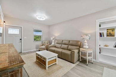 Discover resort-style living close to the shores of Lake on Blue Cypress Golf and RV Resort in Florida - for sale on GolfHomes.com, golf home, golf lot