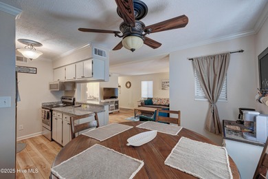 Downtown Calabash! This first-floor furnished condo has been on Carolina Shores Golf Course in North Carolina - for sale on GolfHomes.com, golf home, golf lot