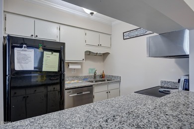 Downtown Calabash! This first-floor furnished condo has been on Carolina Shores Golf Course in North Carolina - for sale on GolfHomes.com, golf home, golf lot