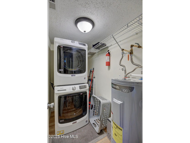 Downtown Calabash! This first-floor furnished condo has been on Carolina Shores Golf Course in North Carolina - for sale on GolfHomes.com, golf home, golf lot