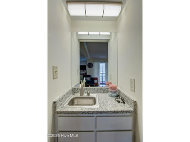 Downtown Calabash! This first-floor furnished condo has been on Carolina Shores Golf Course in North Carolina - for sale on GolfHomes.com, golf home, golf lot