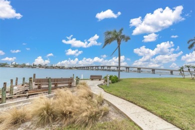 Welcome to your dream retreat! This stunning 2-bedroom on Isla Del Sol Yacht and Country Club in Florida - for sale on GolfHomes.com, golf home, golf lot