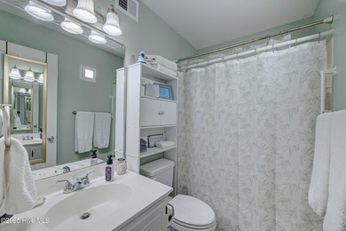 Downtown Calabash! This first-floor furnished condo has been on Carolina Shores Golf Course in North Carolina - for sale on GolfHomes.com, golf home, golf lot