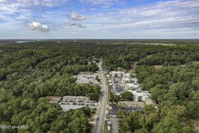 Downtown Calabash! This first-floor furnished condo has been on Carolina Shores Golf Course in North Carolina - for sale on GolfHomes.com, golf home, golf lot