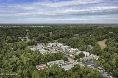Downtown Calabash! This first-floor furnished condo has been on Carolina Shores Golf Course in North Carolina - for sale on GolfHomes.com, golf home, golf lot