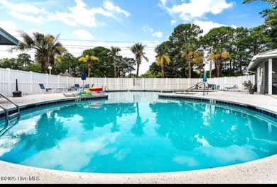 Downtown Calabash! This first-floor furnished condo has been on Carolina Shores Golf Course in North Carolina - for sale on GolfHomes.com, golf home, golf lot