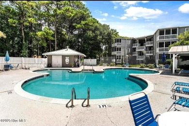 Downtown Calabash! This first-floor furnished condo has been on Carolina Shores Golf Course in North Carolina - for sale on GolfHomes.com, golf home, golf lot