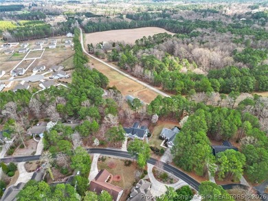 Located in the highly desirable Carolina Trace, this beautifully on Carolina Trace Country Club in North Carolina - for sale on GolfHomes.com, golf home, golf lot