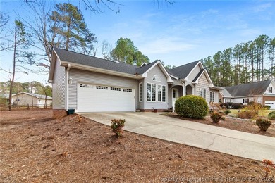 Located in the highly desirable Carolina Trace, this beautifully on Carolina Trace Country Club in North Carolina - for sale on GolfHomes.com, golf home, golf lot