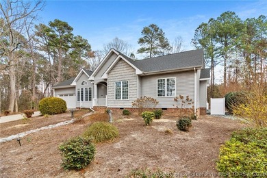 Located in the highly desirable Carolina Trace, this beautifully on Carolina Trace Country Club in North Carolina - for sale on GolfHomes.com, golf home, golf lot