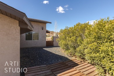 Step into this SINGLE-LEVEL residence, perfectly positioned on a on St. George Golf Course in Utah - for sale on GolfHomes.com, golf home, golf lot