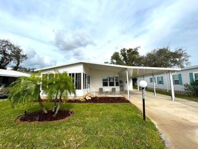 This clean and cozy 2-bedroom, 2-bathroom home offers a on Crystal Lake Club in Florida - for sale on GolfHomes.com, golf home, golf lot