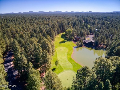 Located on the 11th fairway of Pinetop Lakes Golf and Country on Pinetop Lakes Country Club in Arizona - for sale on GolfHomes.com, golf home, golf lot