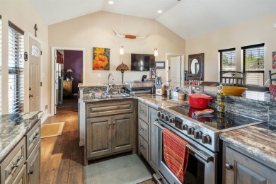 Welcome to 202 Bluebonnet Drive; your perfect Lake Home Retreat! on San Felipe Country Club in Texas - for sale on GolfHomes.com, golf home, golf lot