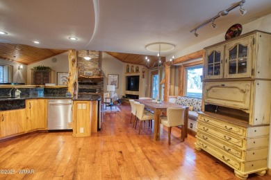 Located on the 11th fairway of Pinetop Lakes Golf and Country on Pinetop Lakes Country Club in Arizona - for sale on GolfHomes.com, golf home, golf lot