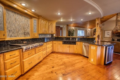 Located on the 11th fairway of Pinetop Lakes Golf and Country on Pinetop Lakes Country Club in Arizona - for sale on GolfHomes.com, golf home, golf lot