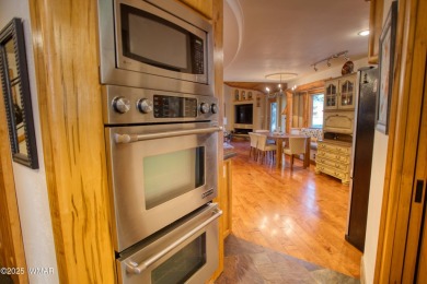 Located on the 11th fairway of Pinetop Lakes Golf and Country on Pinetop Lakes Country Club in Arizona - for sale on GolfHomes.com, golf home, golf lot