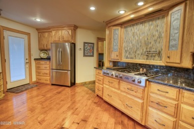 Located on the 11th fairway of Pinetop Lakes Golf and Country on Pinetop Lakes Country Club in Arizona - for sale on GolfHomes.com, golf home, golf lot