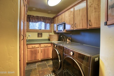 Located on the 11th fairway of Pinetop Lakes Golf and Country on Pinetop Lakes Country Club in Arizona - for sale on GolfHomes.com, golf home, golf lot