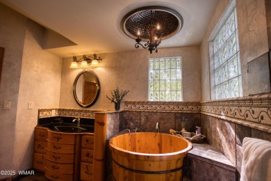 Located on the 11th fairway of Pinetop Lakes Golf and Country on Pinetop Lakes Country Club in Arizona - for sale on GolfHomes.com, golf home, golf lot