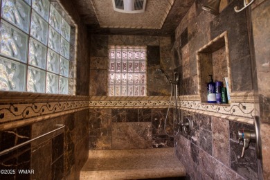 Located on the 11th fairway of Pinetop Lakes Golf and Country on Pinetop Lakes Country Club in Arizona - for sale on GolfHomes.com, golf home, golf lot
