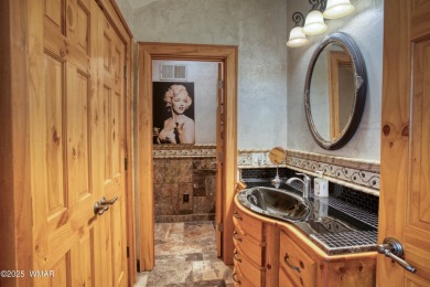 Located on the 11th fairway of Pinetop Lakes Golf and Country on Pinetop Lakes Country Club in Arizona - for sale on GolfHomes.com, golf home, golf lot