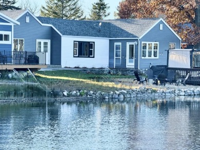 Here's your chance to wake up to shimmering lake views, sip on Grand Rapids Sparta Moose Golf Course in Michigan - for sale on GolfHomes.com, golf home, golf lot