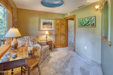 Located on the 11th fairway of Pinetop Lakes Golf and Country on Pinetop Lakes Country Club in Arizona - for sale on GolfHomes.com, golf home, golf lot