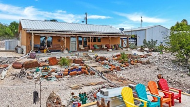 Welcome to 202 Bluebonnet Drive; your perfect Lake Home Retreat! on San Felipe Country Club in Texas - for sale on GolfHomes.com, golf home, golf lot