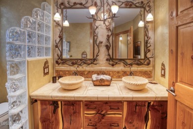 Located on the 11th fairway of Pinetop Lakes Golf and Country on Pinetop Lakes Country Club in Arizona - for sale on GolfHomes.com, golf home, golf lot