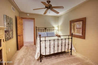 Located on the 11th fairway of Pinetop Lakes Golf and Country on Pinetop Lakes Country Club in Arizona - for sale on GolfHomes.com, golf home, golf lot