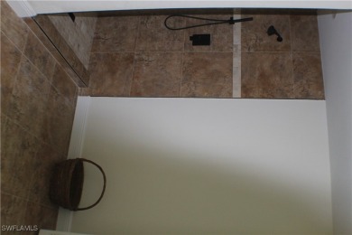 14112 CLUBHOUSE DR BOKEELIA FL 33922 IS A 2 LARGE BEDROOM 2 BATH on Alden Pines Golf Club in Florida - for sale on GolfHomes.com, golf home, golf lot