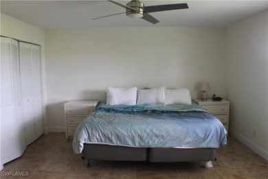 14112 CLUBHOUSE DR BOKEELIA FL 33922 IS A 2 LARGE BEDROOM 2 BATH on Alden Pines Golf Club in Florida - for sale on GolfHomes.com, golf home, golf lot