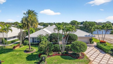 Pristine, traditional home offering 3 bedrooms/den with over on Delray Dunes Golf and Country Club in Florida - for sale on GolfHomes.com, golf home, golf lot
