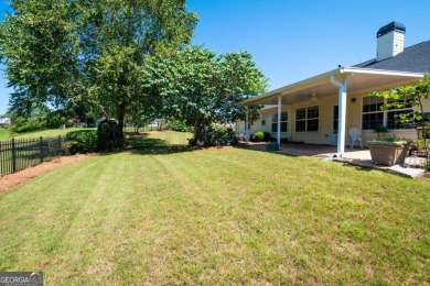 This lovely Ranch style home is located in a cozy neighborhood on Mirror Lake Golf Club in Georgia - for sale on GolfHomes.com, golf home, golf lot