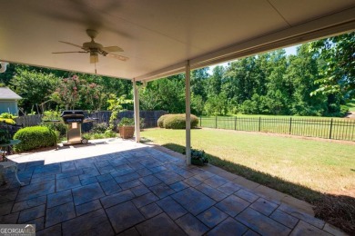 This beautiful Ranch style home is located in a cozy on Mirror Lake Golf Club in Georgia - for sale on GolfHomes.com, golf home, golf lot