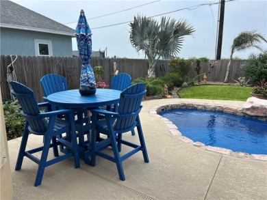 This beautiful Coquina Bay home was built in 2017 and is on Padre Isles Golf Course in Texas - for sale on GolfHomes.com, golf home, golf lot