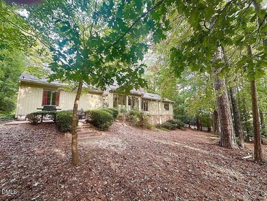 Perfectly positioned on the 17th fairway of Carolina Trace's on Carolina Trace Country Club in North Carolina - for sale on GolfHomes.com, golf home, golf lot