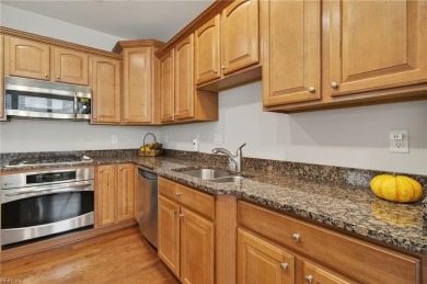 This lovely residence offers comfort, charm. Step into a warm on Colonial Heritage Golf Club in Virginia - for sale on GolfHomes.com, golf home, golf lot