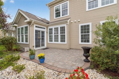 This lovely residence offers comfort, charm. Step into a warm on Colonial Heritage Golf Club in Virginia - for sale on GolfHomes.com, golf home, golf lot